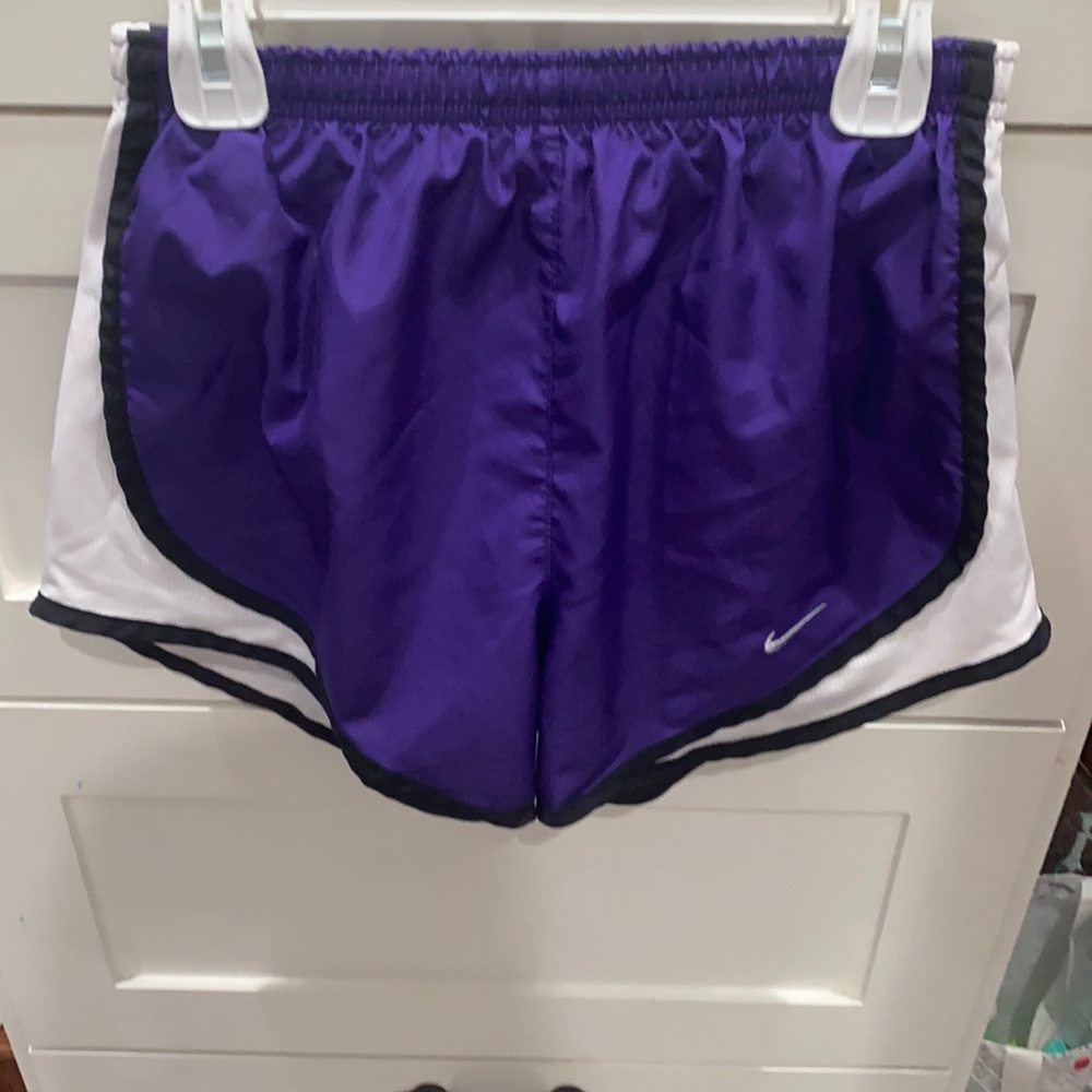 Purple Nike shorts